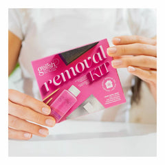 Mano sosteniendo accesorio Gelish Gel Removal Kit