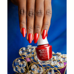 Manicura con esmalte tradicional Morgan Taylor Wonder Woman, color Rojos acabado Shimmer