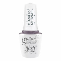 Frasco oficial Gelish Flash Glam Time To Sparkle, envase blanco con tapa FLASH TO ACTIVATE y etiqueta flash GLAM, esmalte en gel lila grisáceo con glitter, 15 ml