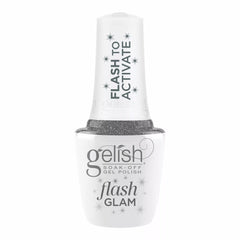 Frasco oficial Gelish Flash Glam Dripping In Bling, envase blanco con tapa FLASH TO ACTIVATE y etiqueta flash GLAM, esmalte en gel plateado con glitter, 15 ml