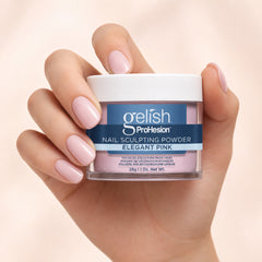 Mano sosteniendo polvo acrílico Gelish ProHesion Nail Sculpting Powder Elegant Pink