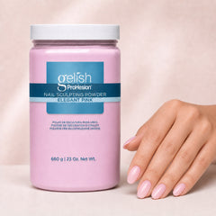 Mano sosteniendo polvo acrílico Gelish ProHesion Nail Sculpting Powder Elegant Pink